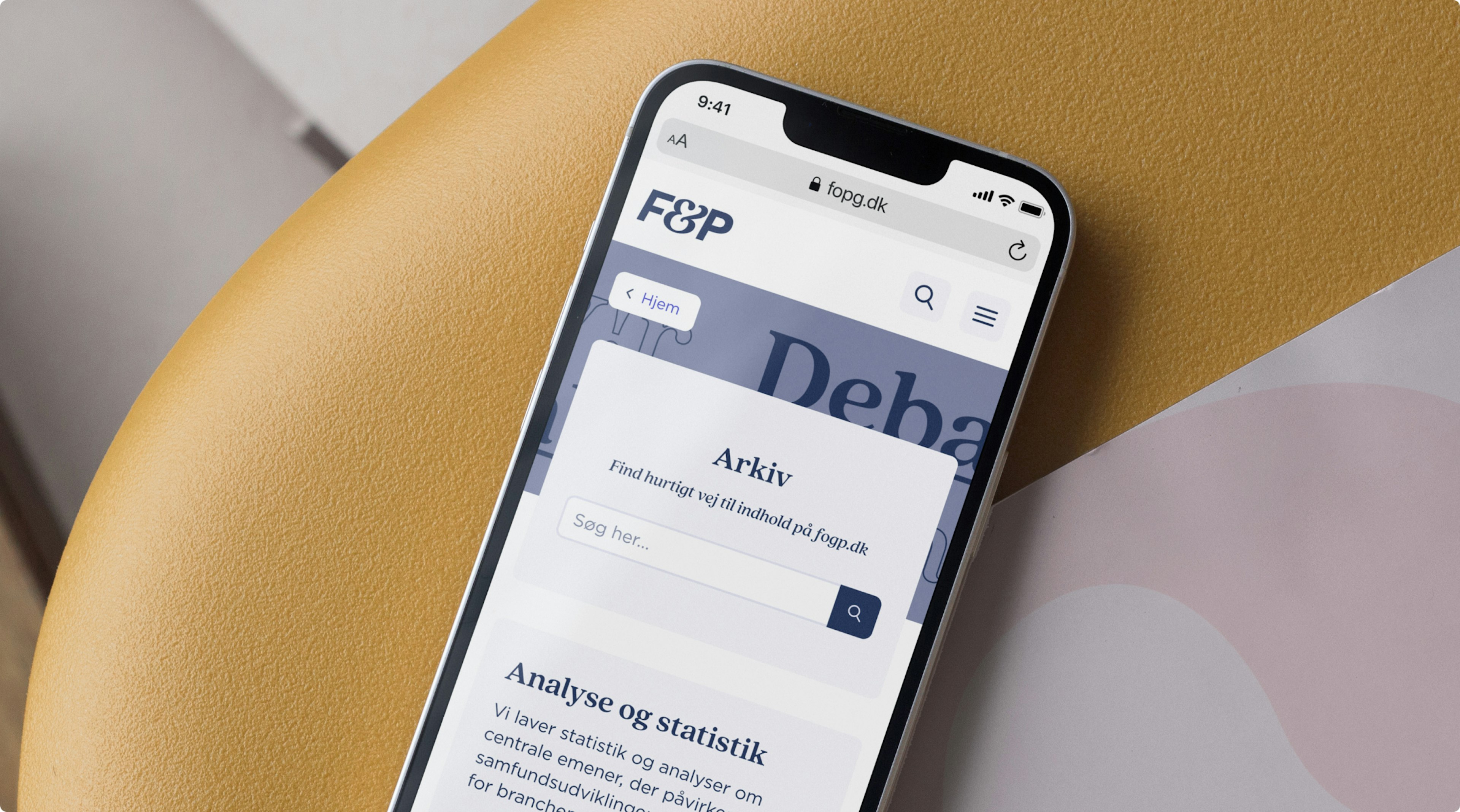 Billede af hjemmesiden på en mobilenhed